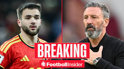 Nicolas Raskin in action for Belgium, with Derek McInnes on the sidelines