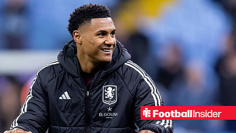 Ollie Watkins about to run up to Villa fans in coat after game