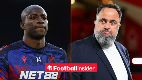 Jean-Philippe Mateta warming up for Crystal Palace, with Evangelos Marinakis in the stands at the City Ground