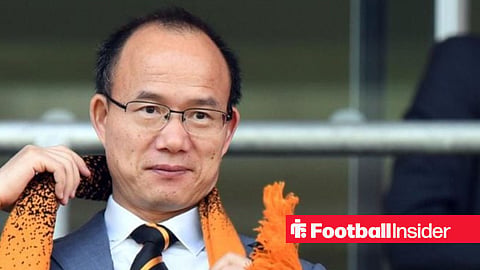 Guo Guangchang with Wolves scarf