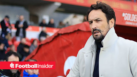 Cesar Peixoto in white coat