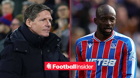 Oliver Glasner in black coat on left, Jean-Philippe Mateta playing for Crystal Palace on right