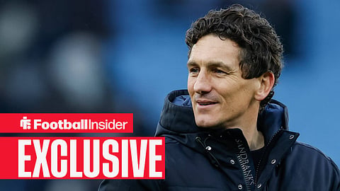Keith Andrews wearing coat