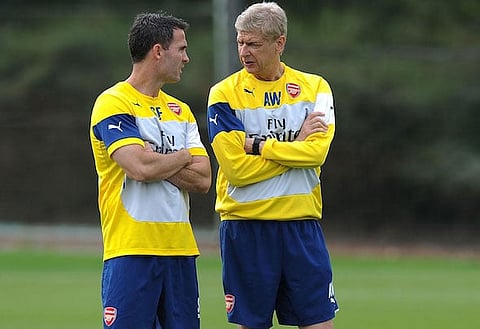 Fighting fit: Arsene Wenger and his staff have to manage Sanchez's workload