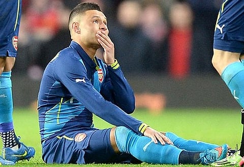Laid out: Oxlade-Chamberlain could be absent for Arsenal permanently