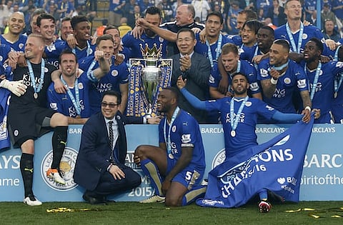 Britain Soccer Football - Leicester City v Everton - Barclays Premier League - King Power Stadium - 7/5/16
Leicester City celebrate with the trophy after winning the Barclays Premier League
Action Images via Reuters / Carl Recine
Livepic
EDITORIAL USE ONLY. No use with unauthorized audio, video, data, fixture lists, club/league logos or "live" services. Online in-match use limited to 45 images, no video emulation. No use in betting, games or single club/league/player publications. Please contact your account representative for further details.