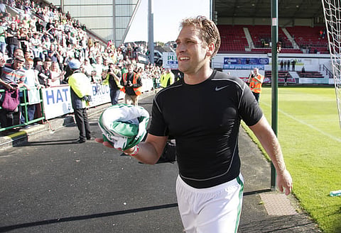 Football - Dunfermline Athletic v Celtic - Jock Stein 30th Anniversary Charity Match - East End Park - 6/9/15
Celtic Legends' Stiliyan Petrov prepares to give his shirt to a supporter
Action Images via Reuters / Graham Stuart
Livepic
EDITORIAL USE ONLY.