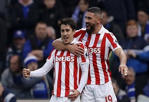 Britain Football Soccer - Stoke City v Leicester City - Premier League - bet365 Stadium - 17/12/16 Stoke City's Bojan Krkic celebrates scoring their first goal with Jonathan Walters Action Images via Reuters / Carl Recine Livepic EDITORIAL USE ONLY. No use with unauthorized audio, video, data, fixture lists, club/league logos or "live" services. Online in-match use limited to 45 images, no video emulation. No use in betting, games or single club/league/player publications. Please contact your account representative for further details.