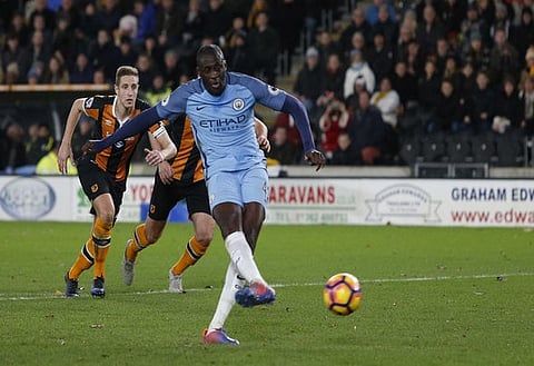 Britain Soccer Football - Hull City v Manchester City - Premier League - The Kingston Communications Stadium - 26/12/16 Manchester City's Yaya Toure scores their first goal from the penalty spot Action Images via Reuters / Ed Sykes Livepic EDITORIAL USE ONLY. No use with unauthorized audio, video, data, fixture lists, club/league logos or "live" services. Online in-match use limited to 45 images, no video emulation. No use in betting, games or single club/league/player publications. Please contact your account representative for further details.