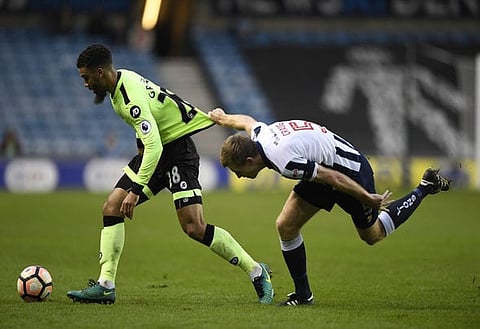 Britain Football Soccer - Millwall v AFC Bournemouth - FA Cup Third Round - The New Den - 7/1/17 Millwall's Tony Craig in action with Bournemouth's Lewis Grabban Action Images via Reuters / Tony O'Brien Livepic EDITORIAL USE ONLY. No use with unauthorized audio, video, data, fixture lists, club/league logos or "live" services. Online in-match use limited to 45 images, no video emulation. No use in betting, games or single club/league/player publications. Please contact your account representative for further details.