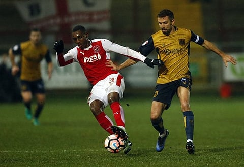 Britain Football Soccer - Fleetwood Town v Bristol City - FA Cup Third Round Replay - Highbury Stadium - 17/1/17 Amari'i Bell of Fleetwood in action with Gary O’Neil of Bristol City Action Images via Reuters / Andrew Boyers Livepic EDITORIAL USE ONLY. No use with unauthorized audio, video, data, fixture lists, club/league logos or "live" services. Online in-match use limited to 45 images, no video emulation. No use in betting, games or single club/league/player publications. Please contact your account representative for further details.
