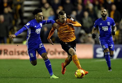 Britain Football Soccer - Wolverhampton Wanderers v Birmingham City - Sky Bet Championship - Molineux - 24/2/17 Wolverhampton Wanderers’ Andreas Weimann and Birmingham’s Josh Cogley in action Mandatory Credit: Action Images / Matthew Childs Livepic EDITORIAL USE ONLY. No use with unauthorized audio, video, data, fixture lists, club/league logos or "live" services. Online in-match use limited to 45 images, no video emulation. No use in betting, games or single club/league/player publications. Please contact your account representative for further details.