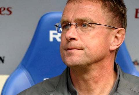 TSG Hoffenheim's coach Ralf Rangnick awaits the start of the German Bundesliga first division soccer match against Hamburg SV in Hamburg April 4, 2009. REUTERS/Morris Mac Matzen (GERMANY SPORT SOCCER) ONLINE CLIENTS MAY USE UP TO SIX IMAGES DURING EACH MATCH WITHOUT THE AUTHORITY OF THE DFL. NO MOBILE USE DURING THE MATCH AND FOR A FURTHER TWO HOURS AFTERWARDS IS PERMITTED WITHOUT THE AUTHORITY OF THE DFL. FOR MORE INFORMATION CONTACT DFL DIRECTLY
