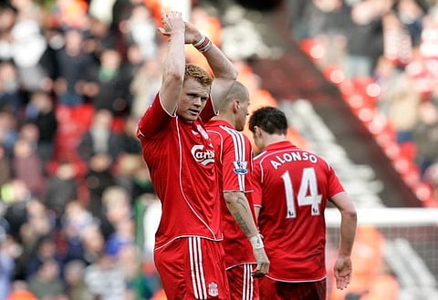 Football - Liverpool v Everton - Barclays Premier League - Anfield - 07/08 - 30/3/08
Liverpool's John Arne Riise applauds the fans at the end
Mandatory Credit: Action Images / Keith Williams
NO ONLINE/INTERNET USE WITHOUT A LICENCE FROM THE FOOTBALL DATA CO LTD. FOR LICENCE ENQUIRIES PLEASE TELEPHONE +44 (0) 207 864 9000.