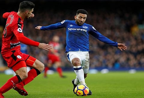Soccer Football - Premier League - Everton vs Huddersfield Town - Goodison Park, Liverpool, Britain - December 2, 2017 Everton's Aaron Lennon in action with Huddersfield Town’s Christopher Schindler REUTERS/Russell Cheyne EDITORIAL USE ONLY. No use with unauthorized audio, video, data, fixture lists, club/league logos or "live" services. Online in-match use limited to 75 images, no video emulation. No use in betting, games or single club/league/player publications. Please contact your account representative for further details.