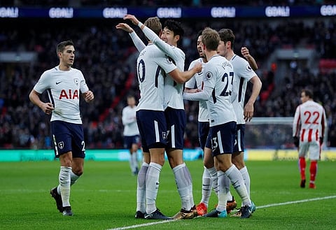Soccer Football - Premier League - Tottenham Hotspur vs Stoke City - Wembley Stadium, London, Britain - December 9, 2017 Tottenham's Son Heung-min celebrates with team mates after Stoke City's Ryan Shawcross scored an own goal and their first Action Images via Reuters/Andrew Couldridge EDITORIAL USE ONLY. No use with unauthorized audio, video, data, fixture lists, club/league logos or "live" services. Online in-match use limited to 75 images, no video emulation. No use in betting, games or single club/league/player publications. Please contact your account representative for further details.