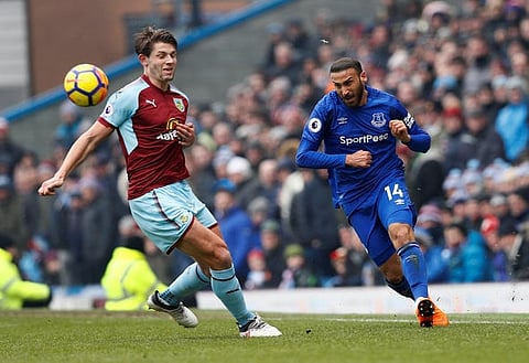 Soccer Football - Premier League - Burnley vs Everton - Turf Moor, Burnley, Britain - March 3, 2018 Everton's Cenk Tosun in action with Burnley's James Tarkowski Action Images via Reuters/Jason Cairnduff EDITORIAL USE ONLY. No use with unauthorized audio, video, data, fixture lists, club/league logos or "live" services. Online in-match use limited to 75 images, no video emulation. No use in betting, games or single club/league/player publications. Please contact your account representative for further details.