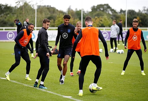Soccer Football - Euro 2020 Qualifier - England Training - St. George’s Park, Burton upon Trent, Britain - September 6, 2019 England's Callum Wilson, Harry Winks, Tyrone Mings and team mates during training Action Images via Reuters/Craig Brough