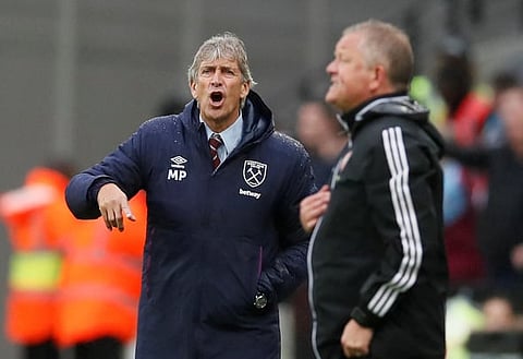Exclusive: Danny Mills suggests Pellegrini playing West Ham giant 'Through gritted teeth'