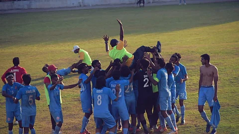 Gujarat team celebrates after defeating Goa in the last group match.