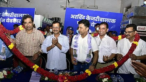 BJP leader Vishwajit K Rane joins Aam Aadmi Party in the presence of its National Convener and Delhi CM Arvind Kejriwal, in Sattari on Tuesday