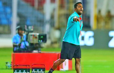 Interim coach Clifford Miranda 