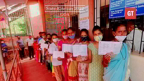 Voters at a polling booth in Canacona