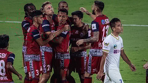 Jamshedpur FC celebrates after a Greg Stewart scores from the penalty spot.