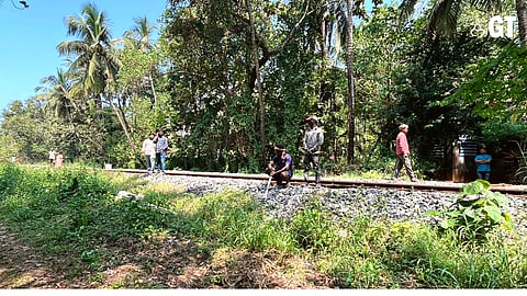 Manuel labourers brought for the fencing work to secure area for the proposed double tracking at Velsao.