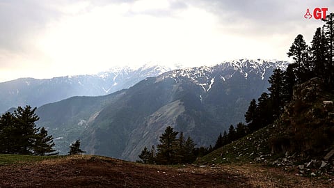 The picturesque mountains call out to photographers and adventure lovers.