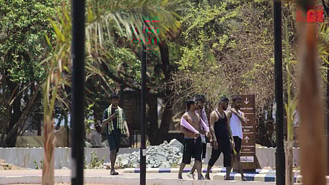Tourists having no sense of decorum at the Miramar beach in Panjim.