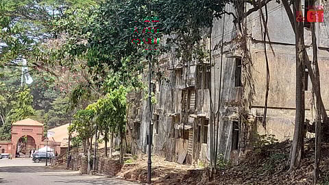 The quarters for jail staff in ruins outside at the entrance of the museum.