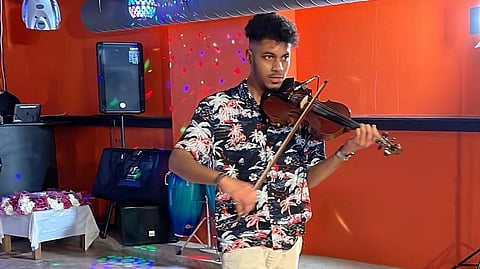 Joanro Gomes plays the violin at the WGD 2022 programme at Hounslow in the UK.