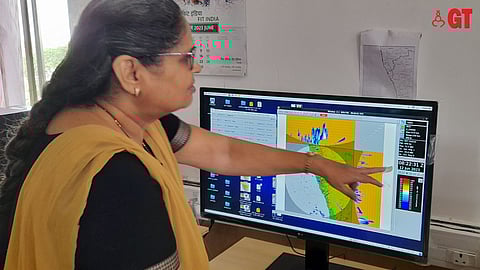 Anita Karandikar, the senior meteorologist at the IMD Goa in Altinho, Panjim, at work studying the weather charts on the computer.