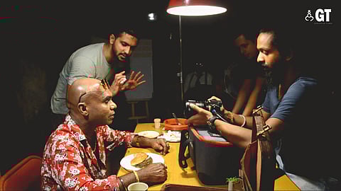 Mukund directing the commercial.