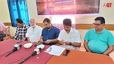 Elvis Gomes (2nd from right) and President of YMCA Panjim Clyde Lobo (3rd from right) during the draw, picking chits and reading out the teams of the respective groups.