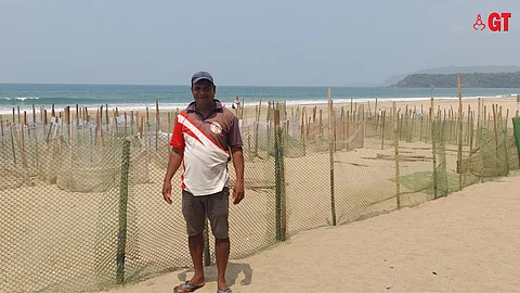 WAIT AND WATCH: Turtle guard, Sukash Pagi, and colleagues are witness to 171 turtles walking ashore on Agonda Beach this year.