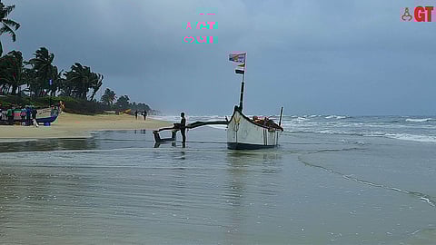 DAY'S HAUL: As monsoons take a break in the Sernabatim village and the sun reappears, canoes bring in the catch from the sea.