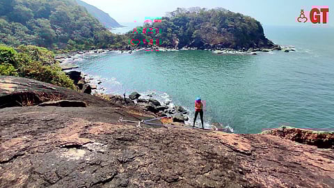 INSPIRED BY WAVES: Those scaling the rocks get to see the azure beauty of the Agonda coastline.