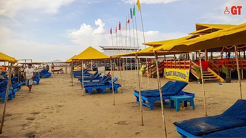 Empty shacks on Morjim beach.