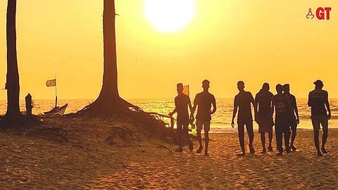 Tourists on a beach in Goa.