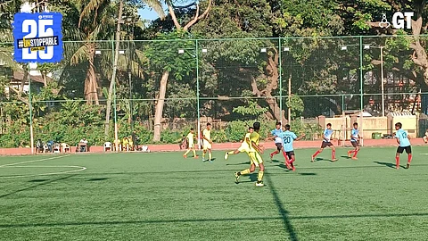 Children playing on the Don Bosco turf ground, in Panjim.