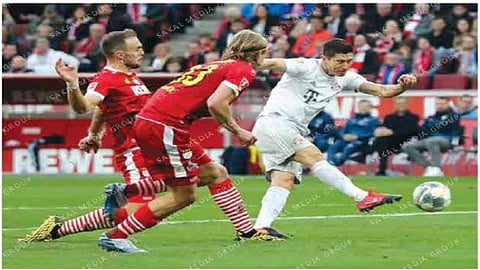 Bayern score three in first 12 minutes to return to top