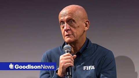 Pierluigi Collina speaking in a FIFA uniform