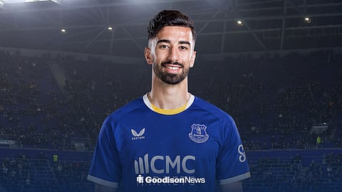 Mohamed Amoura in an Everton kit, with Hill Dickinson Stadium behind him