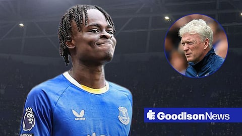 Tyrique George ahead of Hill Dickinson Stadium and David Moyes in an Everton training top.