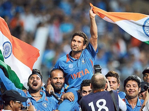 Virat Kohli carrying Sachin Tendulkar on his shoulders during the victory lap after the 2011 World Cup triumph in Mumbai.