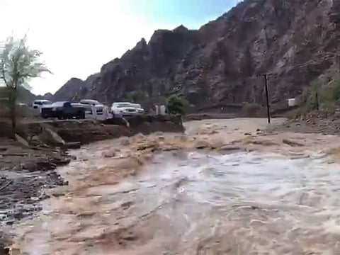 Rain and hail lashed parts of the UAE on Thursday afternoon, resulting in wadis to overflow, inundating some streets.