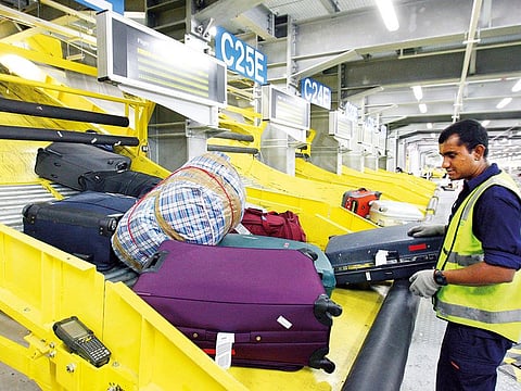 Baggage handling area at Terminal 2 of Dubai International Airport.