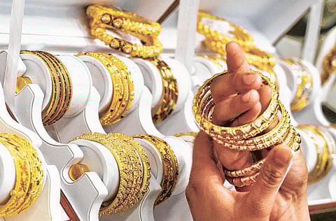 Gold bangles on sale at a jewellery store in India.